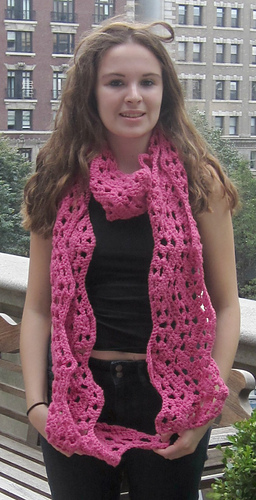 Wide_ripple_scarf_pink_beth_buildings_close_up_medium