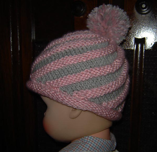 Ravelry: Spiral Hat with Pom-pom - Knitting pattern pattern by Cathy Ren