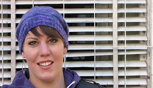 Purple-hat-farther-away-looking-at-camera-smile-low-res_medium