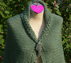 Hex_green_durable_shawl_style_pinned_in_front_points_hanging_small